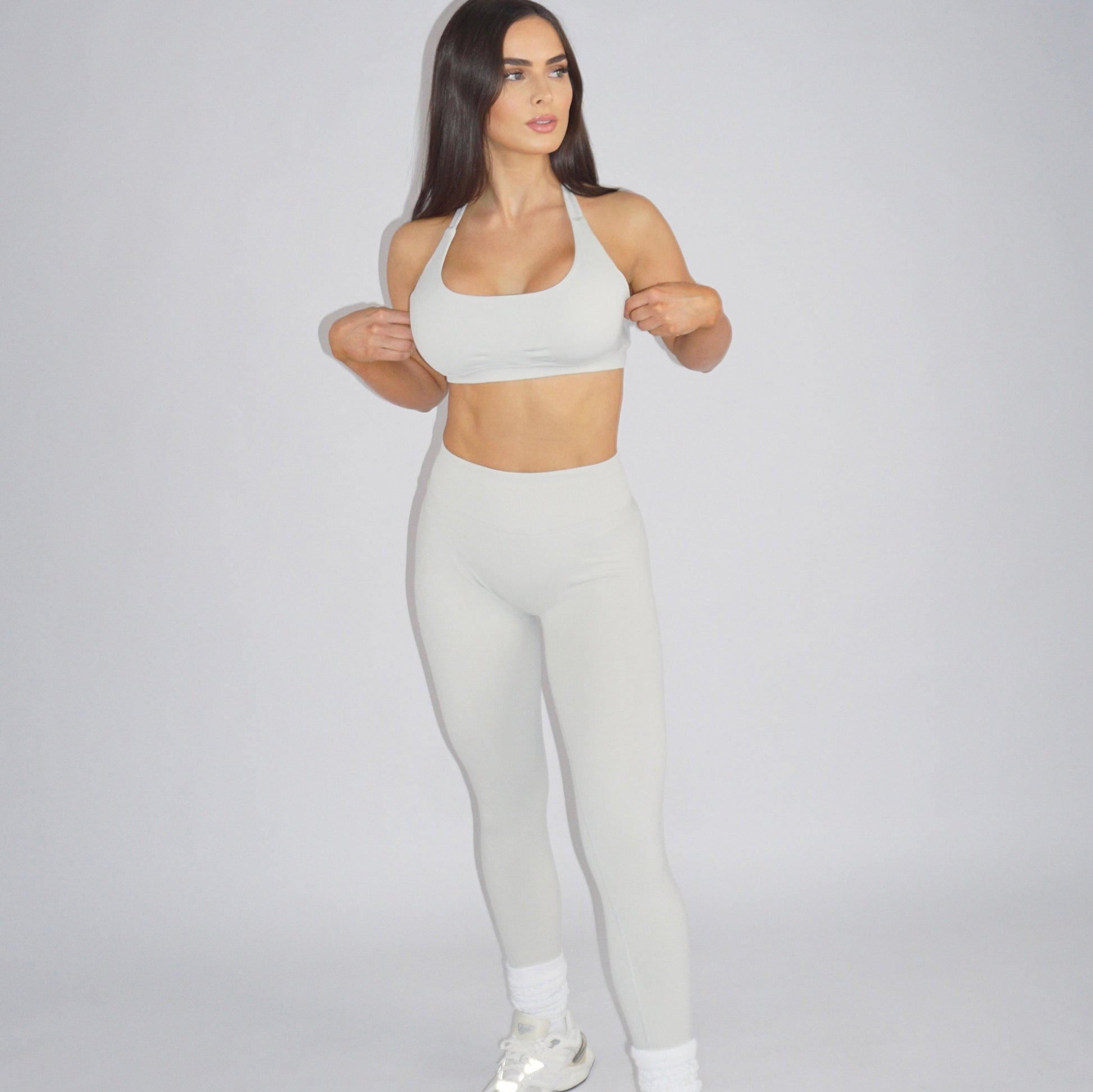 Morr Defined Leggings in Lunar White-Beige, featuring a low-rise elastic waistband, full-length seamless design, and lightweight, breathable spandex-nylon fabric for elegant comfort and style.